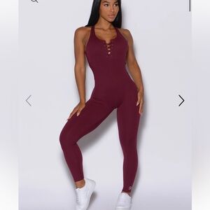 Red bombshell lace up bodysuit